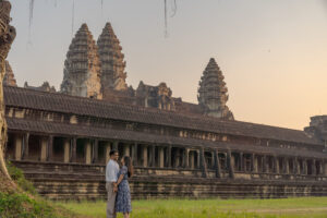 Angkor Wat at sunrise with couple on a photoshoot in Siem Reap