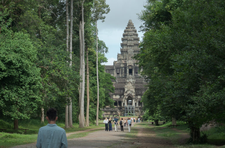Tree-lined path leading to the East Gate entrance of Angkor Wat