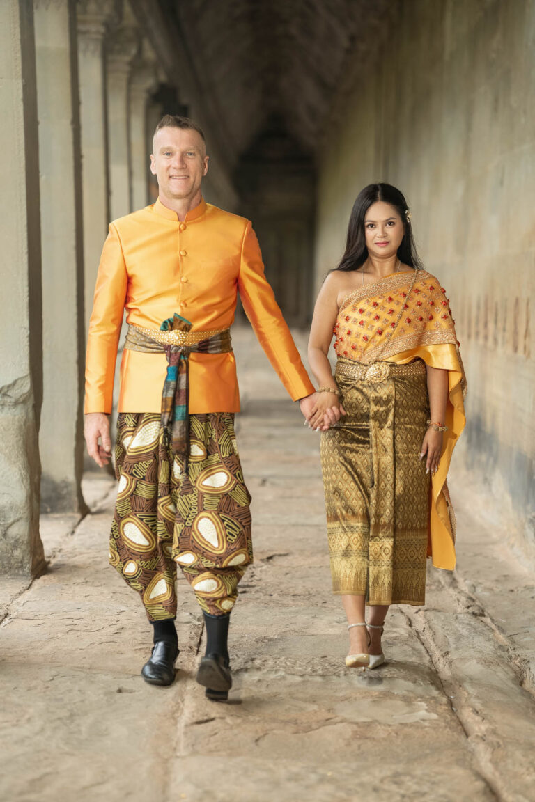 Couple wearing traditional Khmer clothing at Angkor Wat, Cambodia