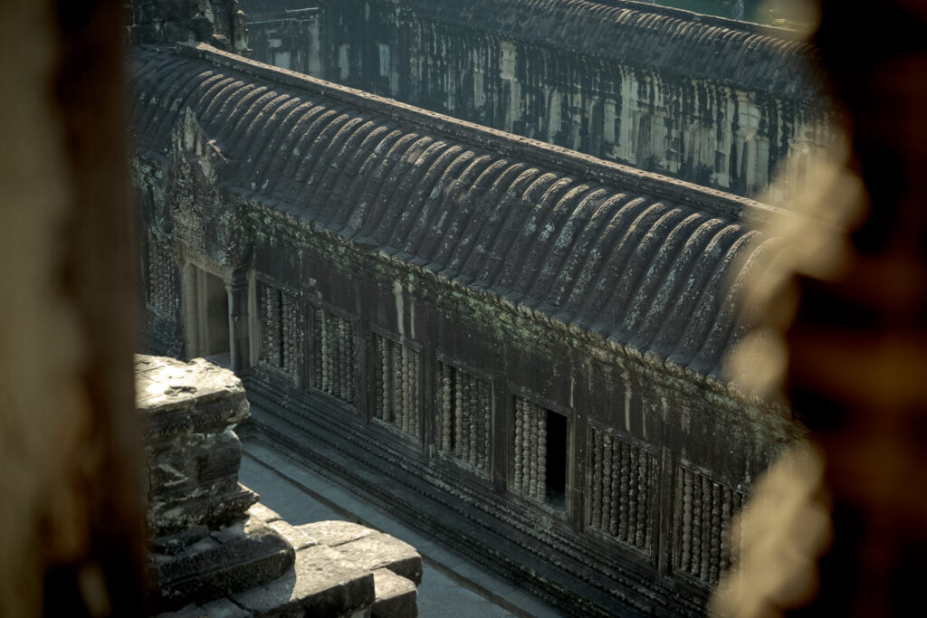 View down onto a stone gallery from the Bakan upper level of Angkor Wat