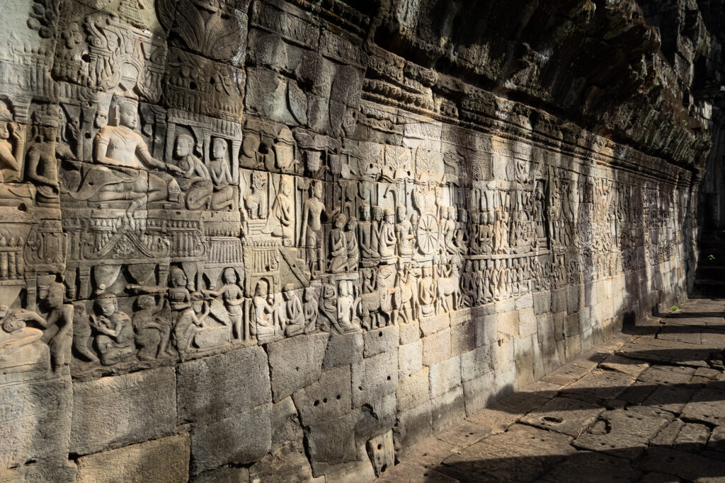 Detailed bas-relief carvings inside Bayon Temple, Angkor Thom