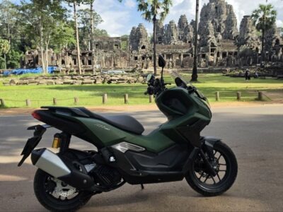 Motorbike parked in front of Bayon Temple at Angkor Thom.
