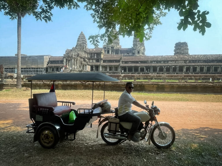 Tuk Tuk and driver at Angkor Wat Temple