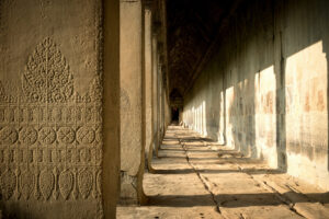 Covered stone gallery and columns at Angkor Wat temple, Cambodia