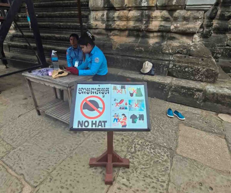 Bakan dress code and no hat sign at Angkor Wat