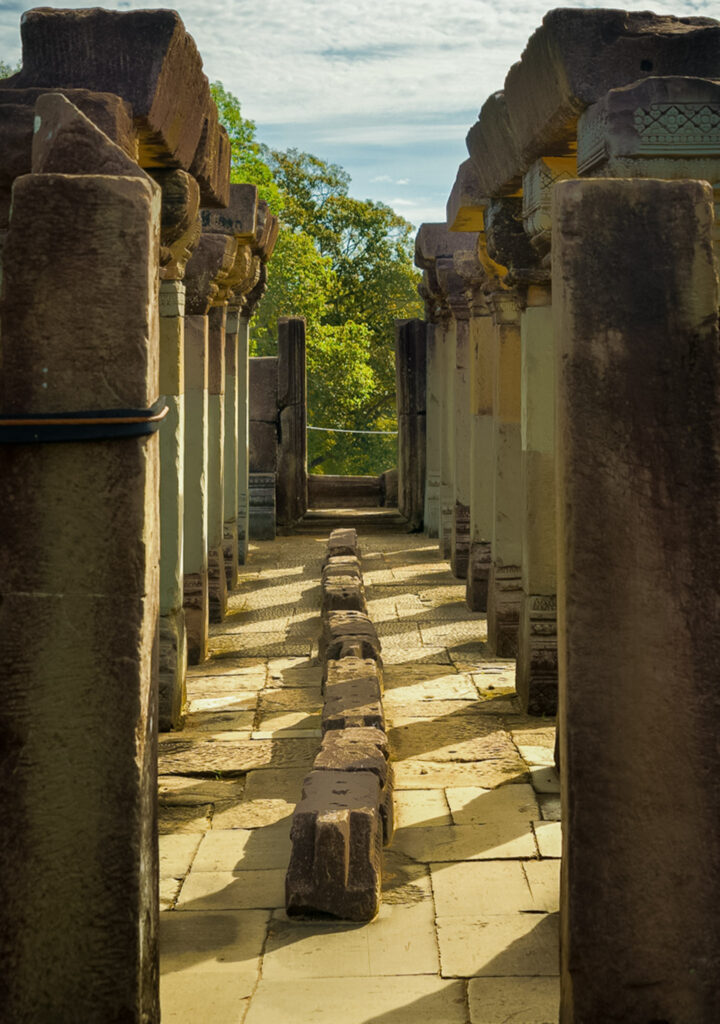 Narrow stone passage through Baphuon Temple
