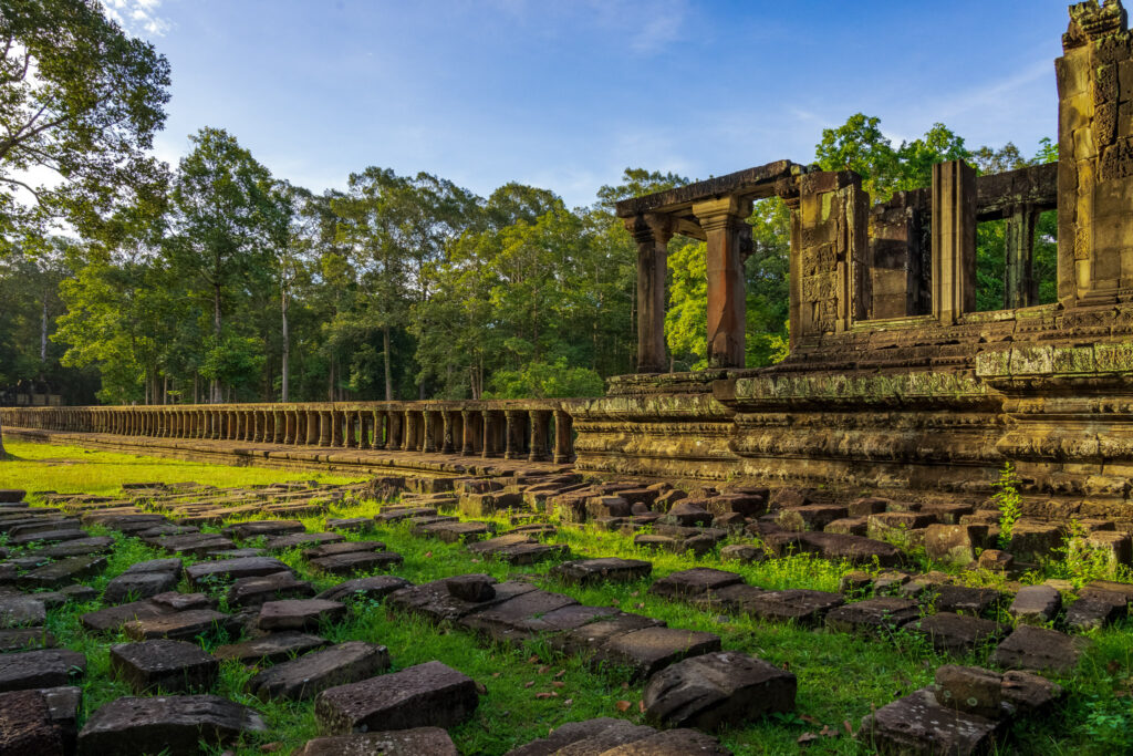 Raised sandstone causeway leading through the grounds of Baphuon Temple
