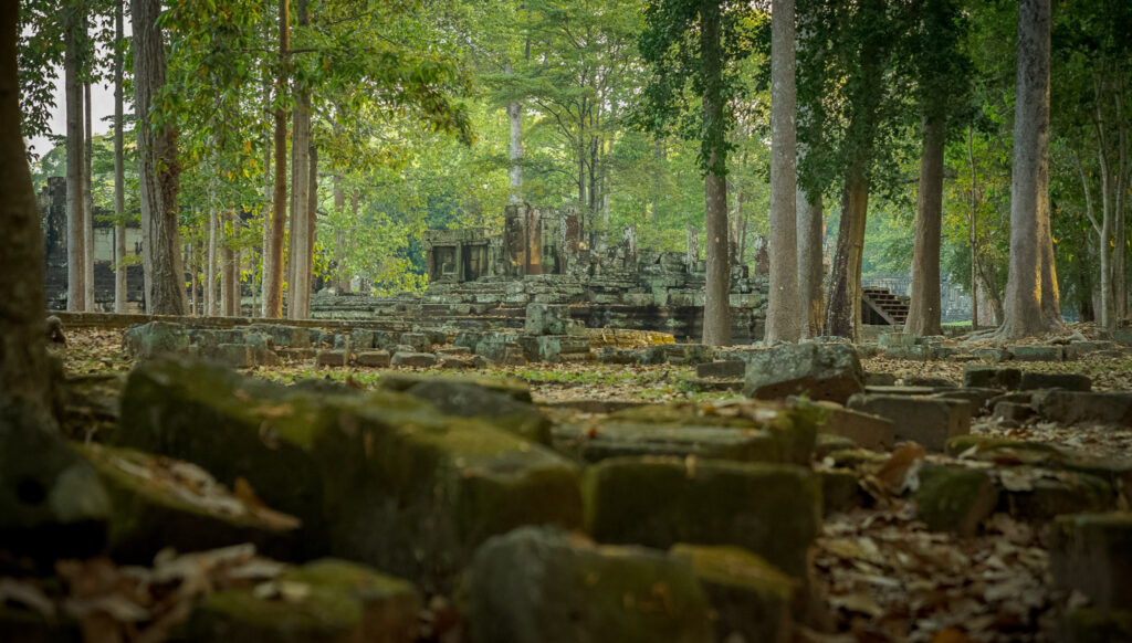 Weathered sandstone ruins within the Baphuon Temple complex