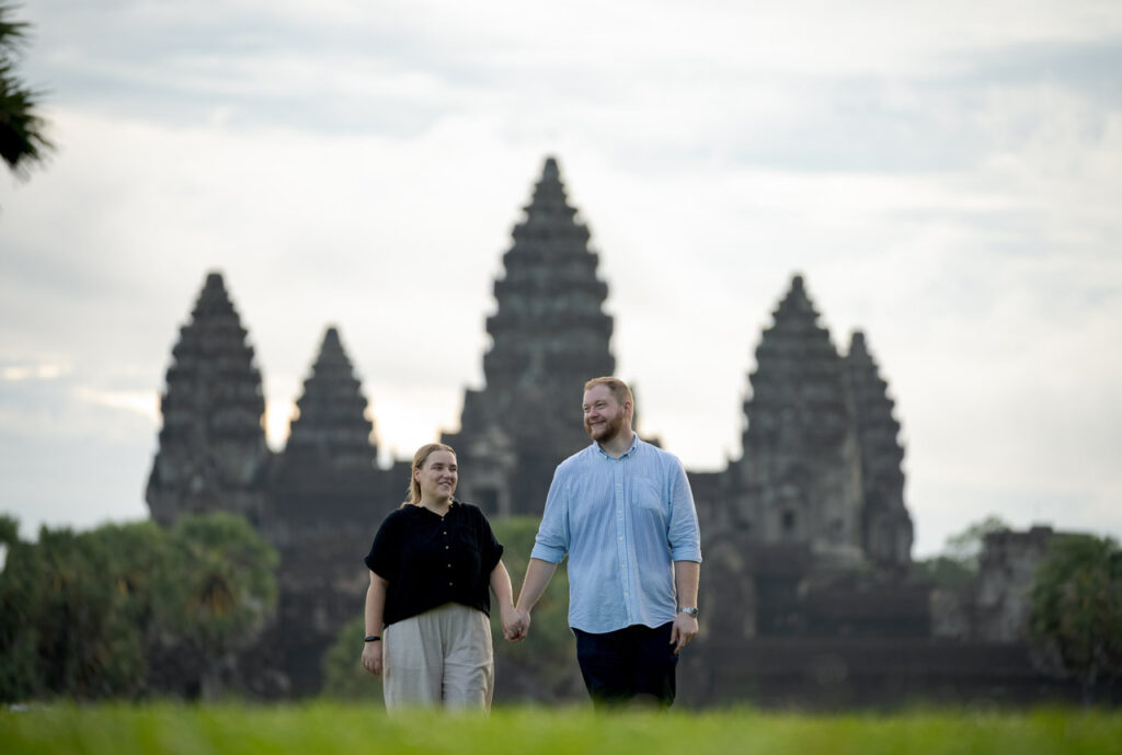 Couple walking together during an Angkor photoshoot